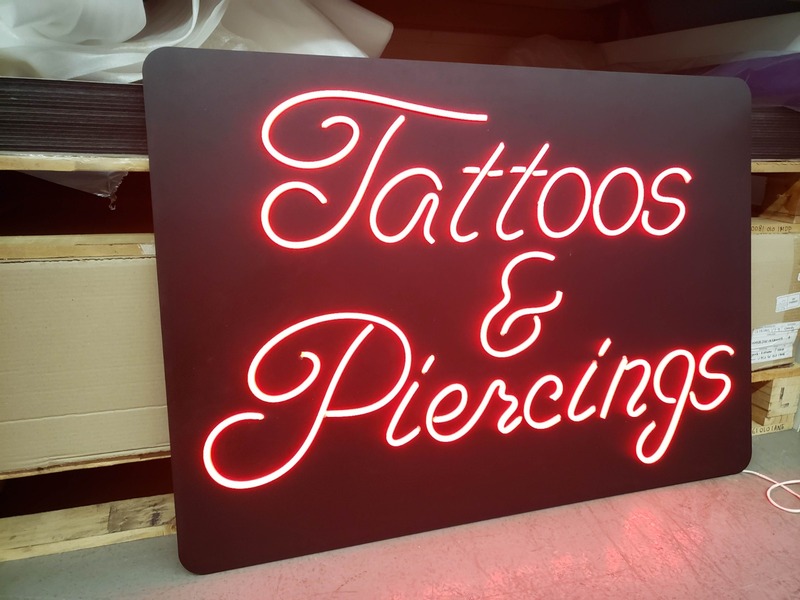Custom red neon sign for tattoo shop