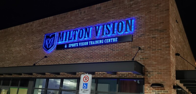Milton Vision exterior backlit LED sign photographed at night