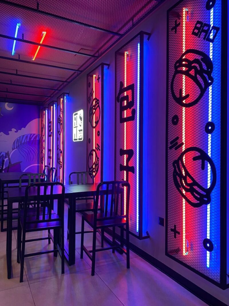 LED tube light decorative installation in a restaurant interior