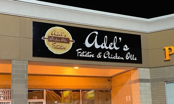 Adel's Cambridge illuminated storefront sign